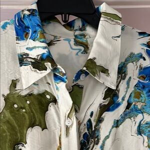 Watercolor design midi. Has pockets and a belt.  Wear with or without the belt.